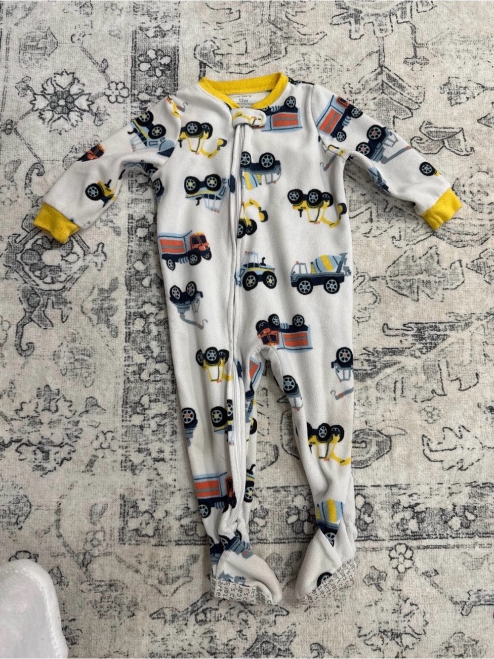 Carter's White One-Piece Footie Pajamas with Yellow Trim and Vehicle Print